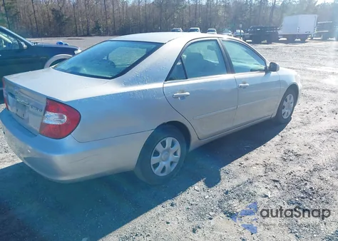 2002 Toyota Camry Le z USA, uszkodzony, nr VIN 4T1BE32KX2U117098